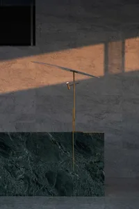 A modern reception counter with a marble finish and minimalist design.
