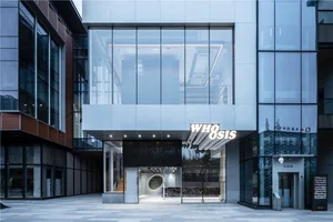 A modern commercial interior featuring a glass facade and interior design elements.