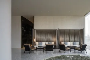 A modern interior design space featuring textured wall panels.