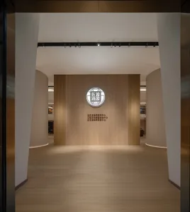 A welcoming indoor entryway designed in a modern style with wooden materials