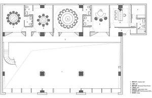 A detailed 2D architectural drawing of a restaurant's interior layout, featuring tables and chairs arranged on wooden floors