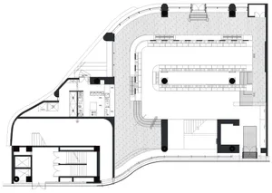 A detailed 2D architectural drawing depicting the floor layout of a building.