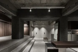 Concrete storefront featuring contemporary design elements.