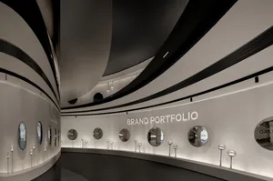 A retail shop display featuring metallic and glass elements.