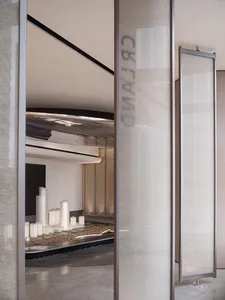 A modern architectural model display view showing model buildings and cityscape elements.