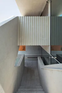 Modern Industrial Home Interior Design with Concrete Walls and Stairs