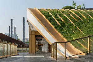 Modern building interior with green roof and striped facade