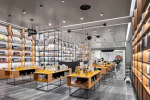 A modern retail store interior featuring wood and metal elements.