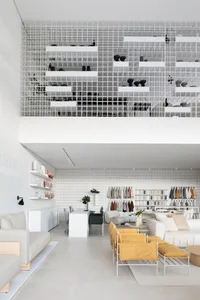Modern retail store interior with metal shelves and ceramic tiles