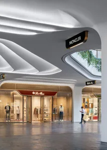 Modern retail storefront featuring glass and concrete materials