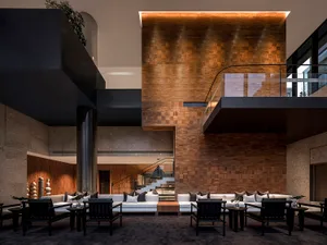 Modern lobby interior featuring wooden materials and contemporary design elements