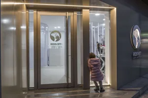 Modern veterinary clinic entry with glass and metal elements