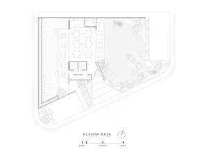 A detailed floor plan of an outdoor seating area with concrete paving and seating arrangements.