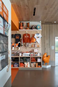 Retail storefront with grooming supplies on shelves and hanging display