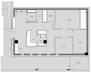 Minimalist residential floor plan with bedrooms, kitchen, and storage areas.