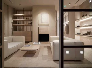 A modern retail space featuring neutral-toned materials and minimalist design elements.