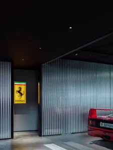 Modern metal garage interior with Ferrari F40
