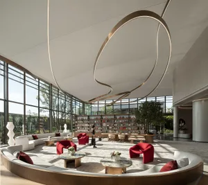Modern office lounge library with concrete, glass, and marble materials
