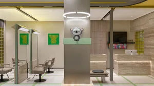 Modern salon interior featuring minimalist design elements, contemporary furniture, and a branded mascot on the pillar.