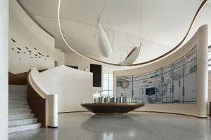 A modern spa interior with concrete and glass materials.