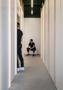 A minimalist interior with modern, concrete architectural elements.