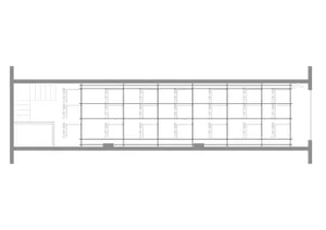 White and black architectural blueprint of a building layout plan.