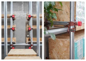 Steel beams and connectors forming a construction framework.