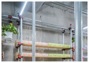 Industrial storage system with metal shelves and boxes.