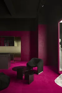 A modern retail storefront with metallic finishes, featuring sleek, minimalist design elements and a vibrant color palette.