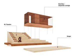 Modern theater stage with a wooden design and a separate lounge area.