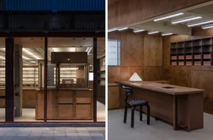 A glasses shop with a wooden interior counter and display cases.