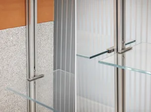 Glass shelves mounted with aluminum rails, showcasing contemporary design elements.