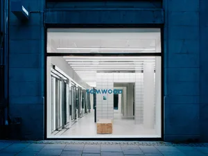 A modern storefront with large glass windows.
