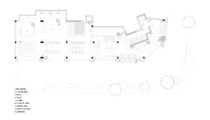 Detailed architectural floor plan of a modern, minimalist concrete reading room with furniture arrangement and signage.