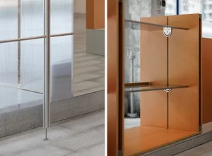Modern retail storefront featuring metal and glass windows