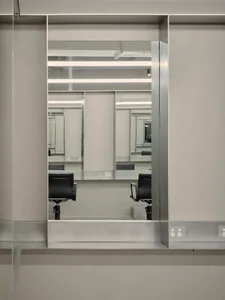 Folding glass walls in a modern office space.