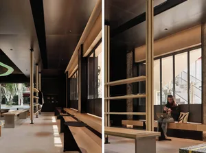 A modern coffee shop featuring concrete and wood materials.