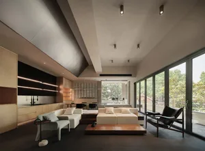 Modern, minimalist interior design featuring mixed materials in a contemporary condo setting
