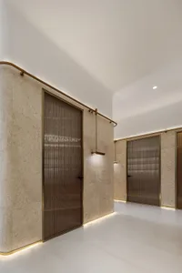 Modern interior design featuring stone and concrete materials, showcasing contemporary architectural elements and a minimalis