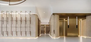 Modern lobby area with marble walls and floors