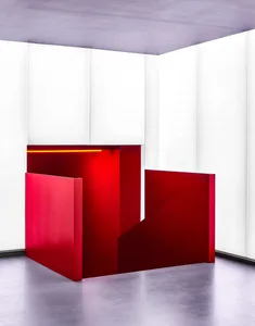 A modern metallic divider in minimalist room setting