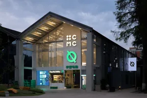 A modern storefront with large glass windows.