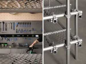 Metal shelves with tools mounted on pegboard in a workshop setting.