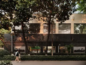 Modern storefront featuring a concrete exterior and large windows