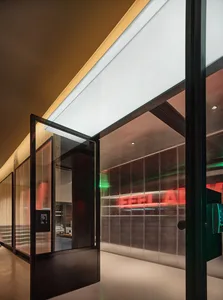 A modern interior with a prominent glass wall