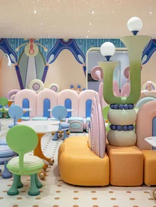 A vibrant and whimsical cafe interior with pastel colors and whimsical furniture.