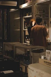 A scene from an industrial-themed bar featuring metallic materials.