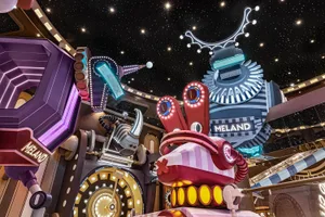 A futuristic robotic installation featuring metallic materials and a vibrant color palette.