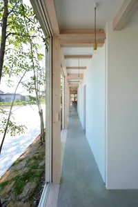 A modern interior space featuring concrete walls and floors.
