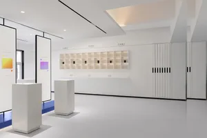 A minimalist exhibition space with modern design elements.